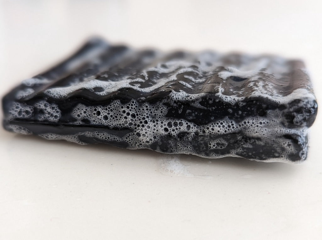 Image of sudsy charcoal soap